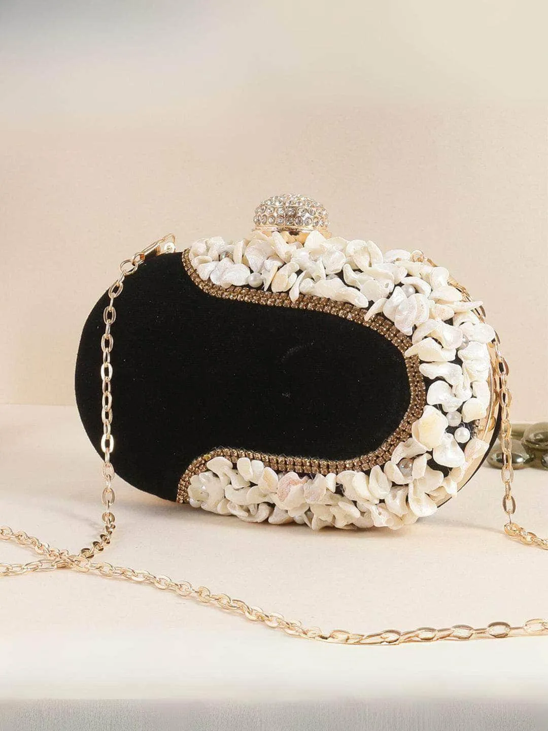 Oval Shape Clutch With Shell Work